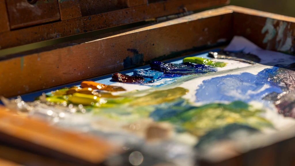 An original plein-air oil painting of the White Mountains in late afternoon light